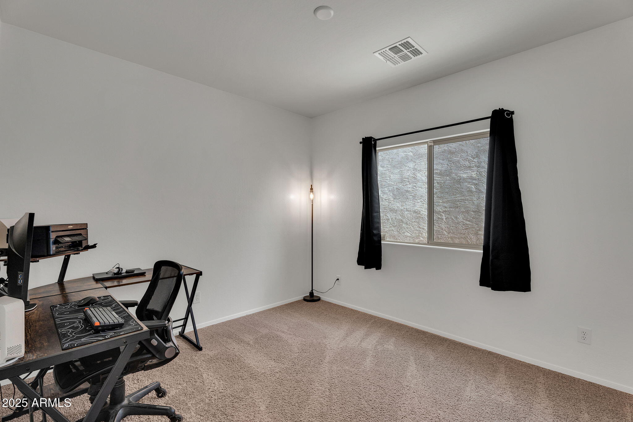 6579 West Georgetown Way Florence, AZ 85132 - Photo 31 of 60 a view of workspace with furniture and a window