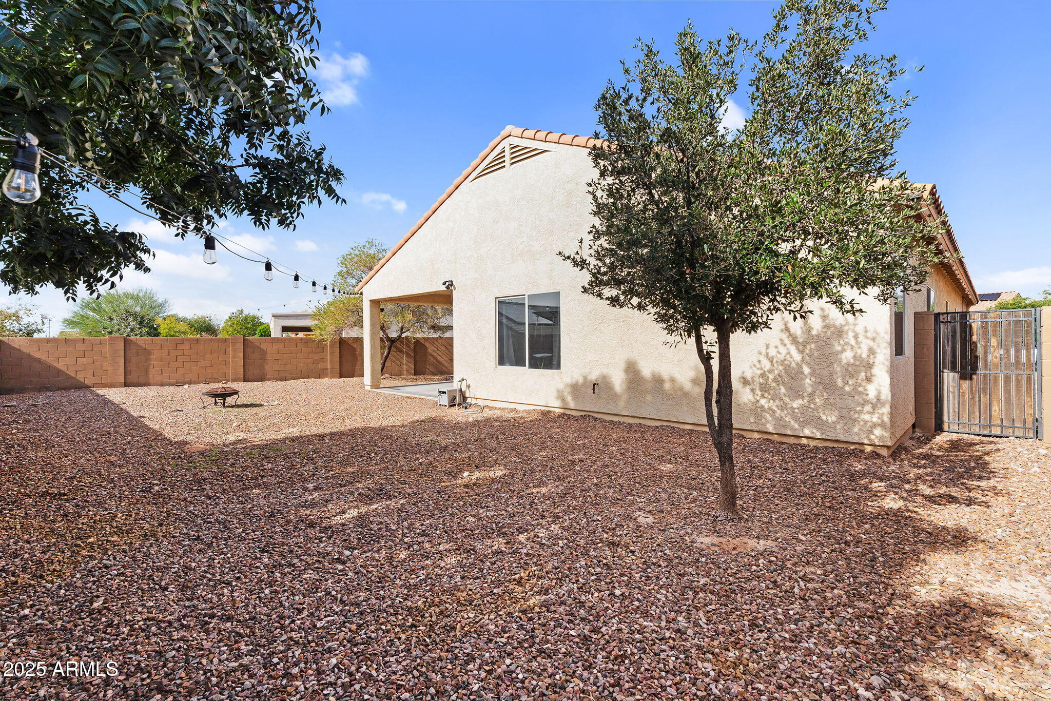 6579 West Georgetown Way Florence, AZ 85132 - Photo 36 of 60 a view of a house with a backyard
