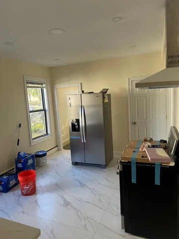 a room with furniture and a window