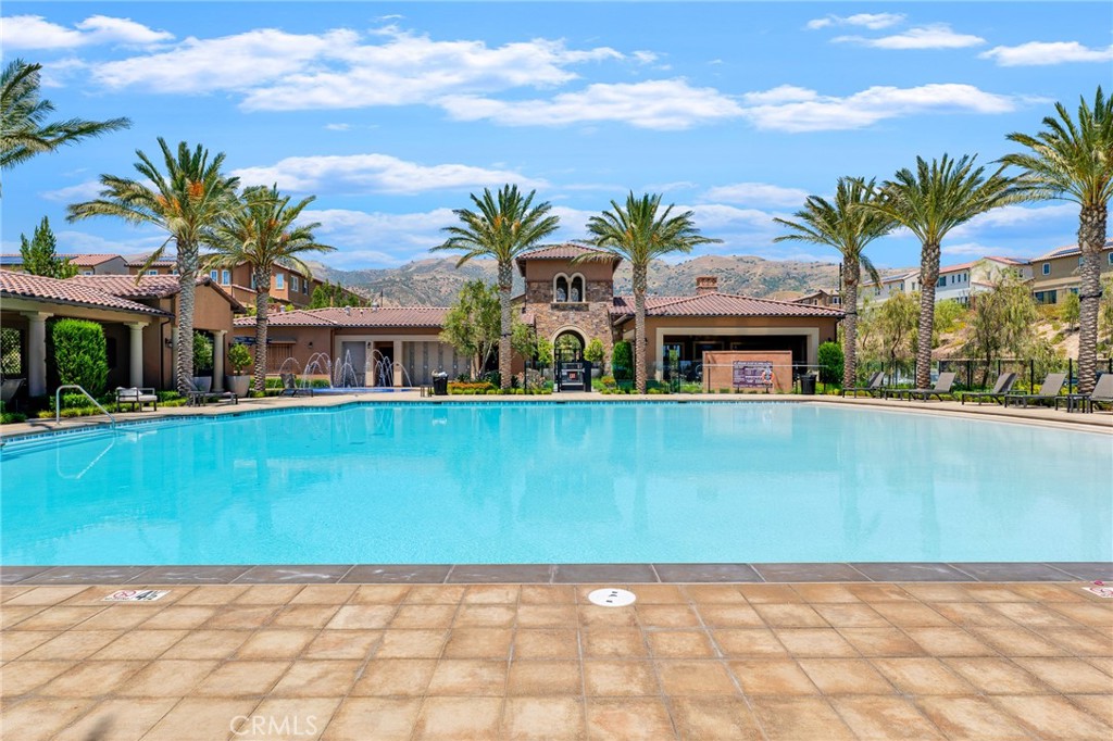 20717 Pine Cone Circle Porter Ranch, CA 91326 - Photo 12 of 31 a view of multiple houses with a yard