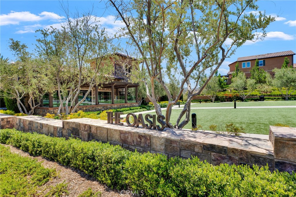 20717 Pine Cone Circle Porter Ranch, CA 91326 - Photo 21 of 31 a view of a garden with a bench