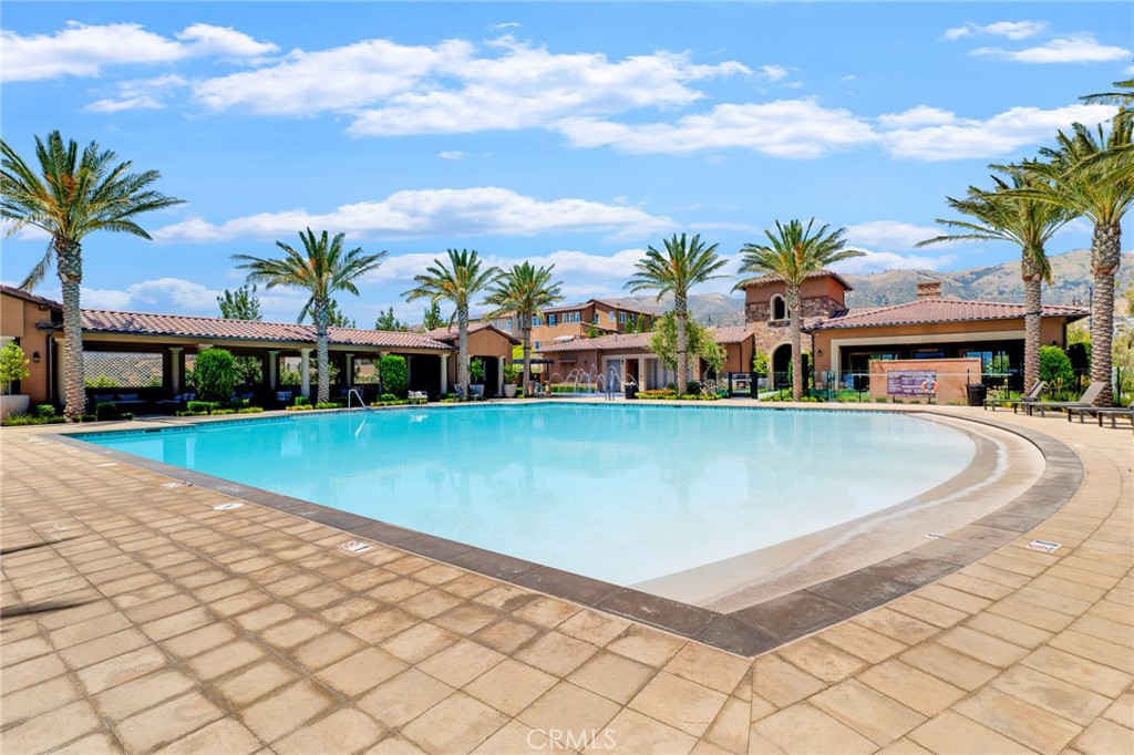 20717 Pine Cone Circle Porter Ranch, CA 91326 - Photo 28 of 31 a view of outdoor space with swimming pool and lounge chair