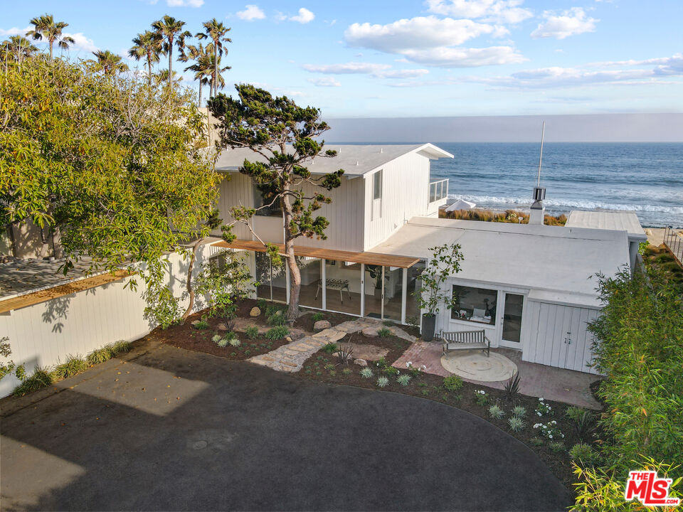 31284 Broad Beach Road Malibu, CA 90265 - Photo 3 of 31 an aerial view of a house with a yard and garden in front of it
