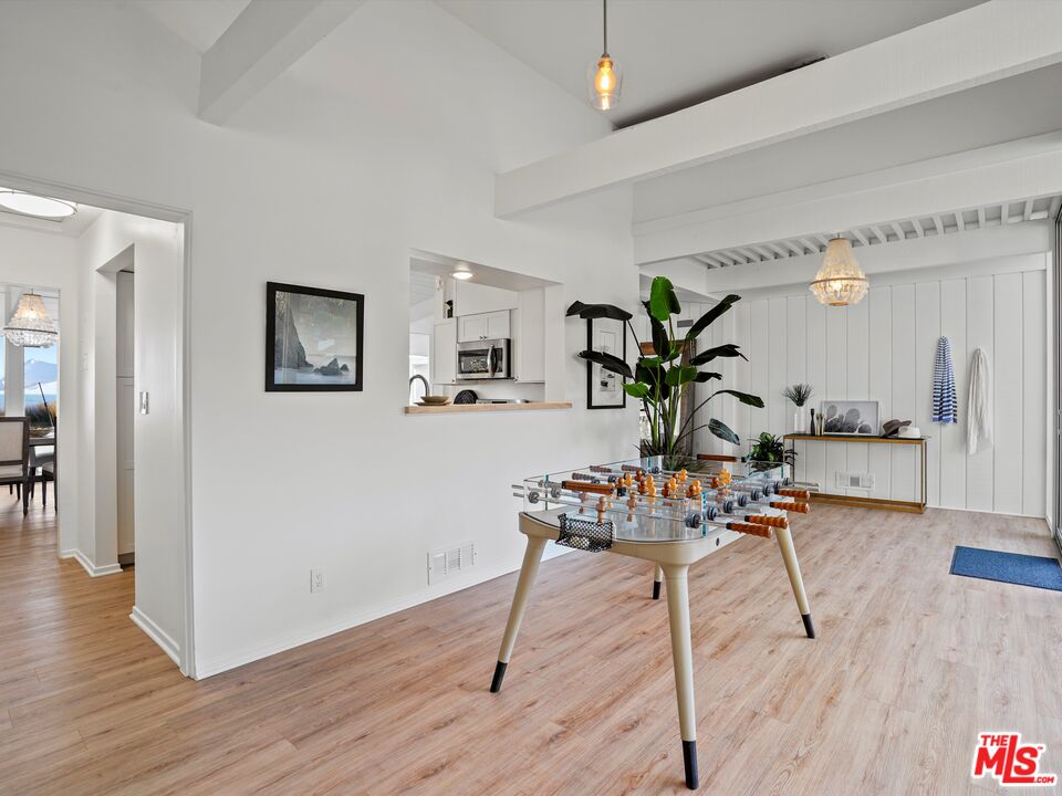 31284 Broad Beach Road Malibu, CA 90265 - Photo 4 of 31 a living room with furniture and wooden floor