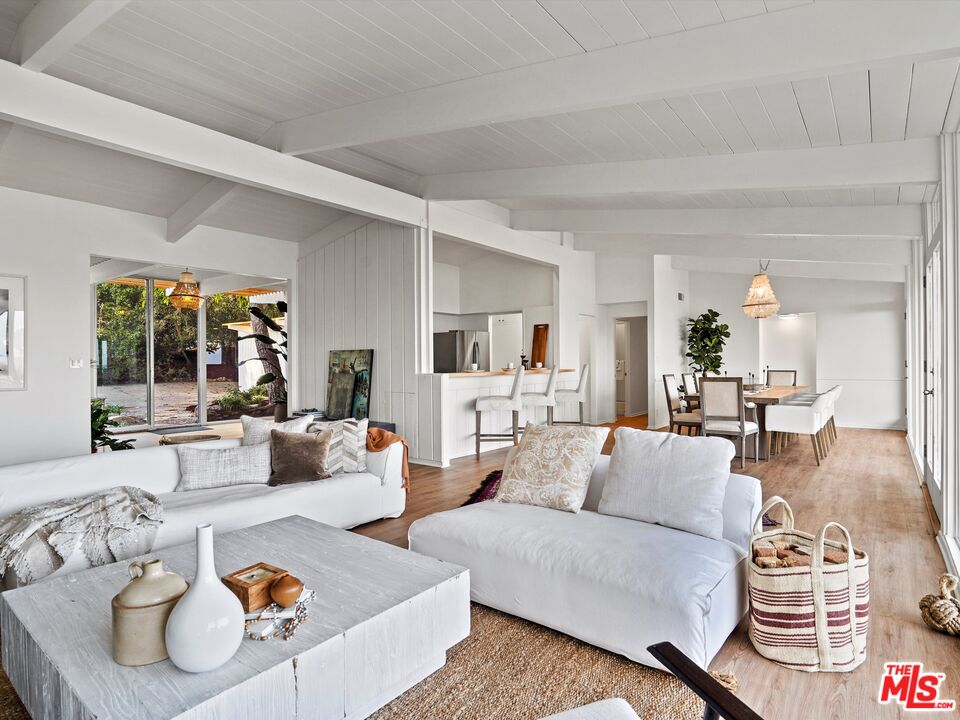 31284 Broad Beach Road Malibu, CA 90265 - Photo 9 of 31 a living room with furniture and a large window