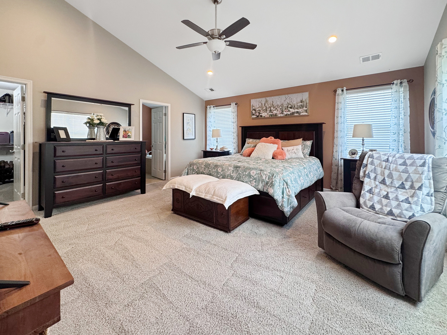1210 Falcon Ridge Drive Elgin, IL 60124 - Photo 21 of 35 a spacious bedroom with a bed and a couch
