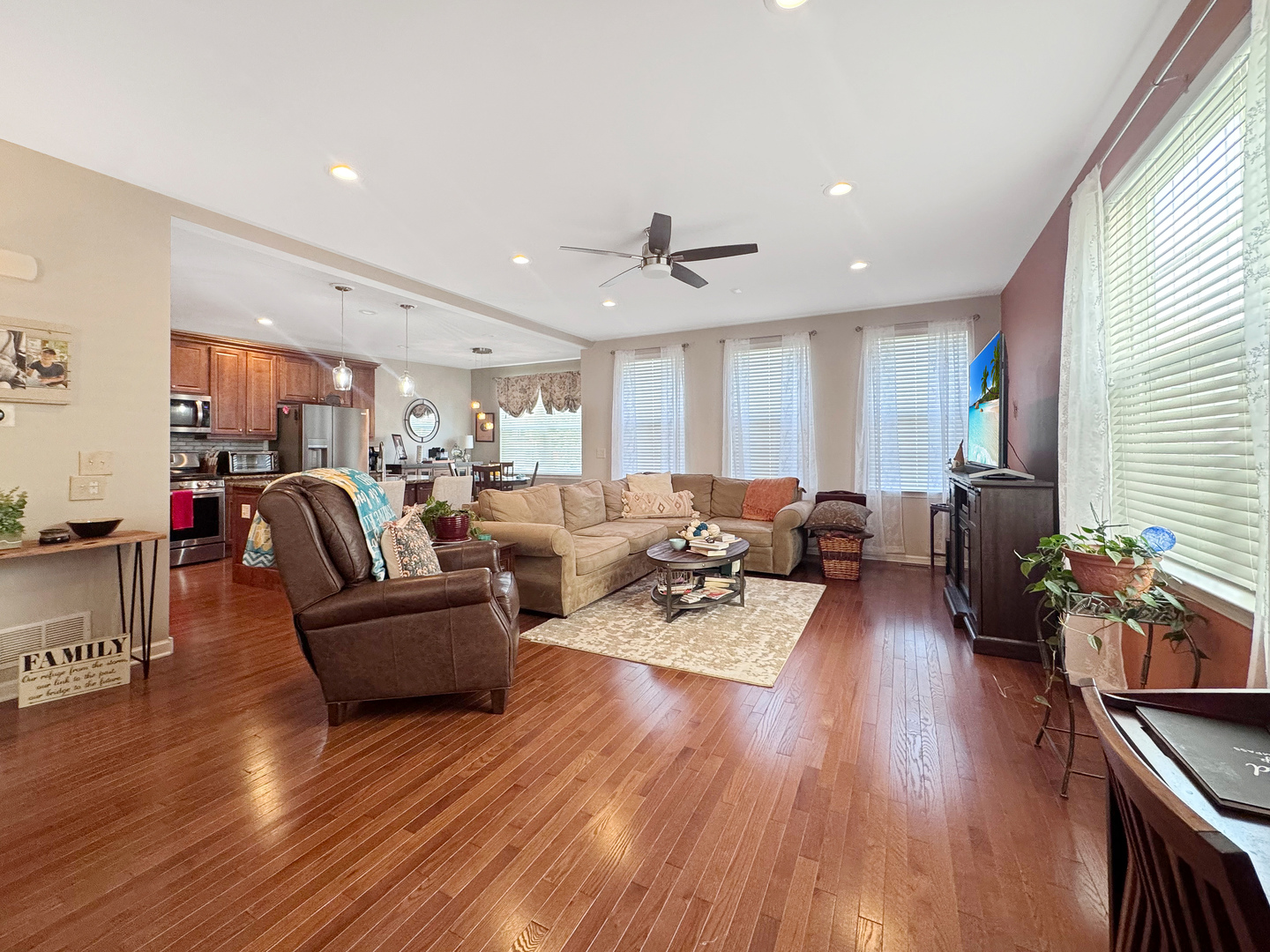 1210 Falcon Ridge Drive Elgin, IL 60124 - Photo 8 of 35 a living room with furniture fireplace and wooden floor