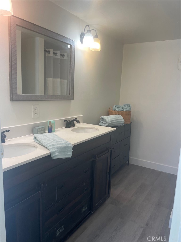 32802 Valle Road, Unit 135 San Juan Capistrano, CA 92675 - Photo 16 of 26 a bathroom with a sink and a mirror