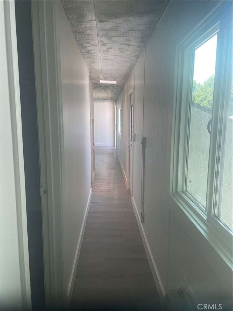 32802 Valle Road, Unit 135 San Juan Capistrano, CA 92675 - Photo 18 of 26 a view of hallway with windows