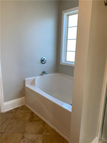 a bathroom with a bathtub