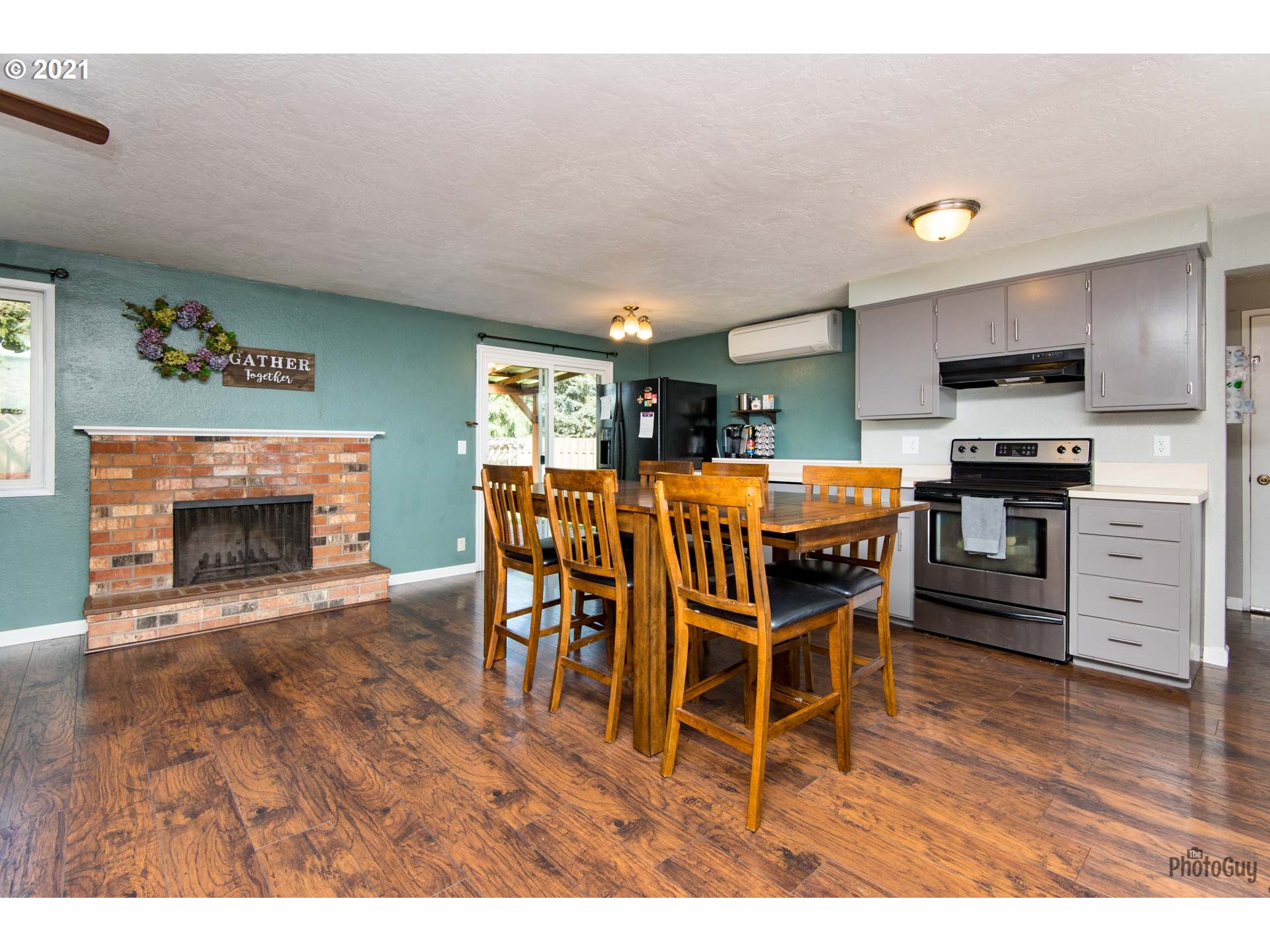 2268 6th Street Springfield, OR 97477 - Photo 3 of 28 a dining room with furniture and wooden floor