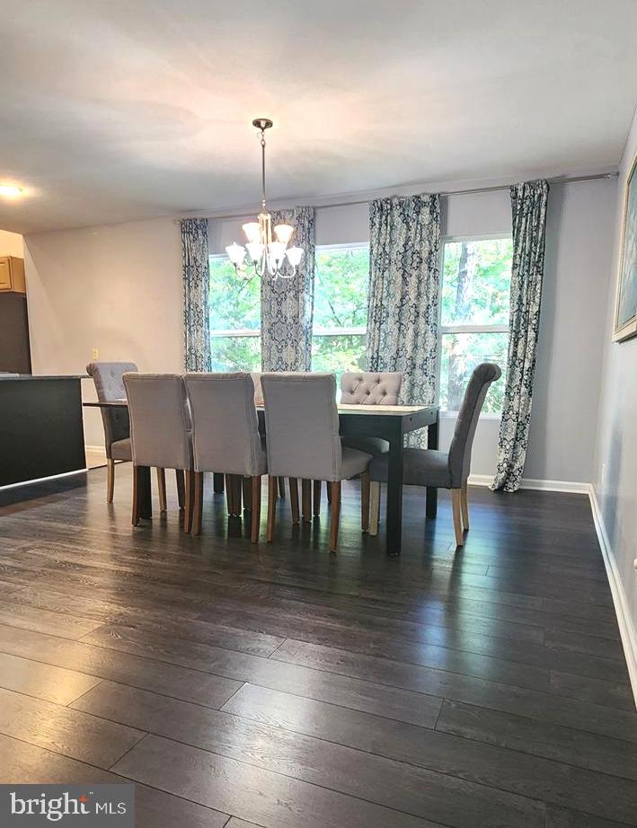 1112 Lee Road Basye, VA 22810 - Photo 15 of 102 a view of a dining room with furniture wooden floor and chandelier