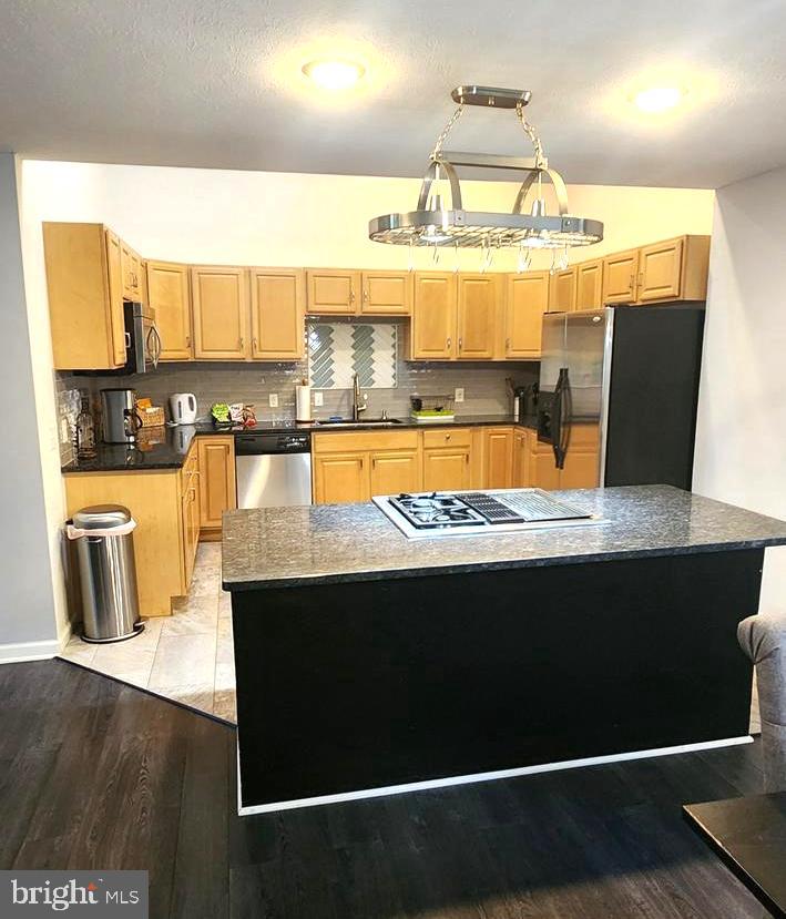 1112 Lee Road Basye, VA 22810 - Photo 17 of 102 a view of a kitchen with kitchen island a counter top space appliances and cabinets