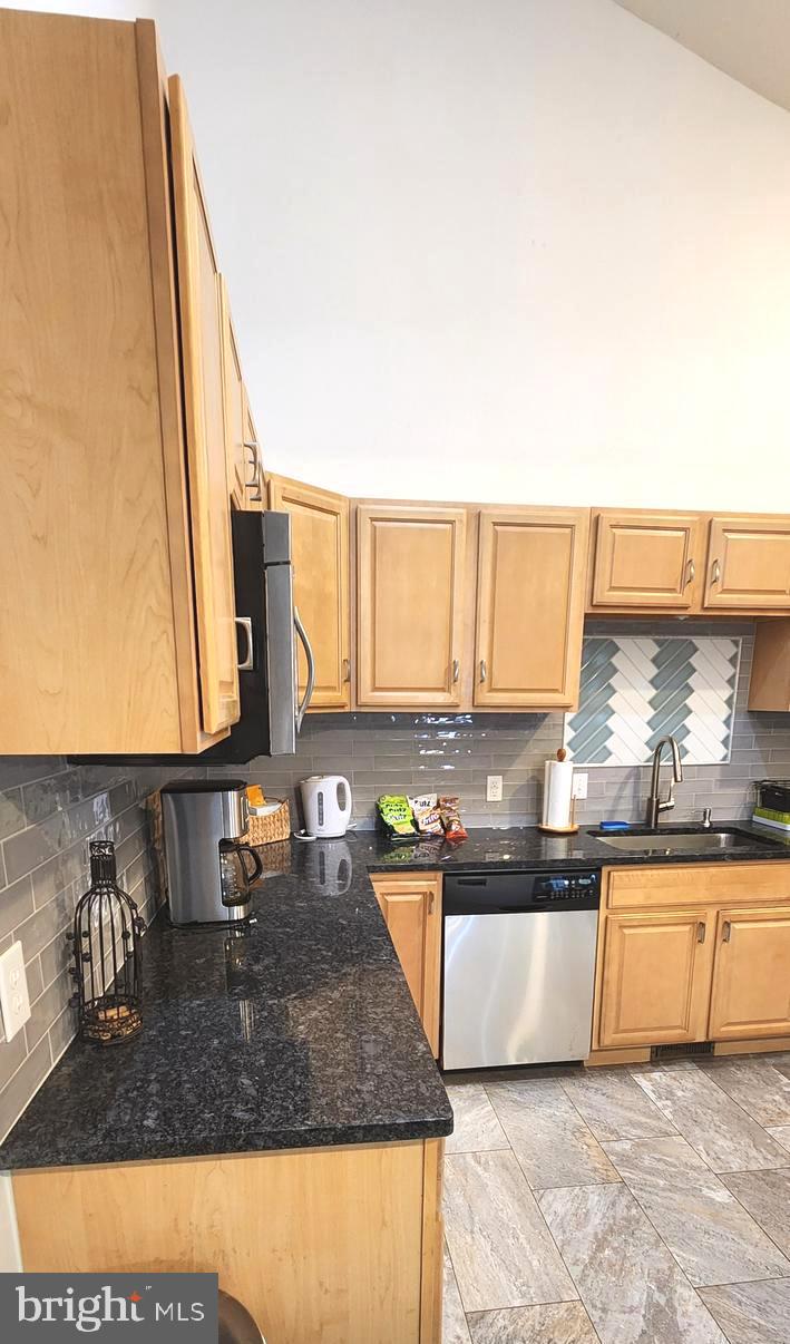 1112 Lee Road Basye, VA 22810 - Photo 20 of 102 a kitchen with a sink a counter top space and cabinets