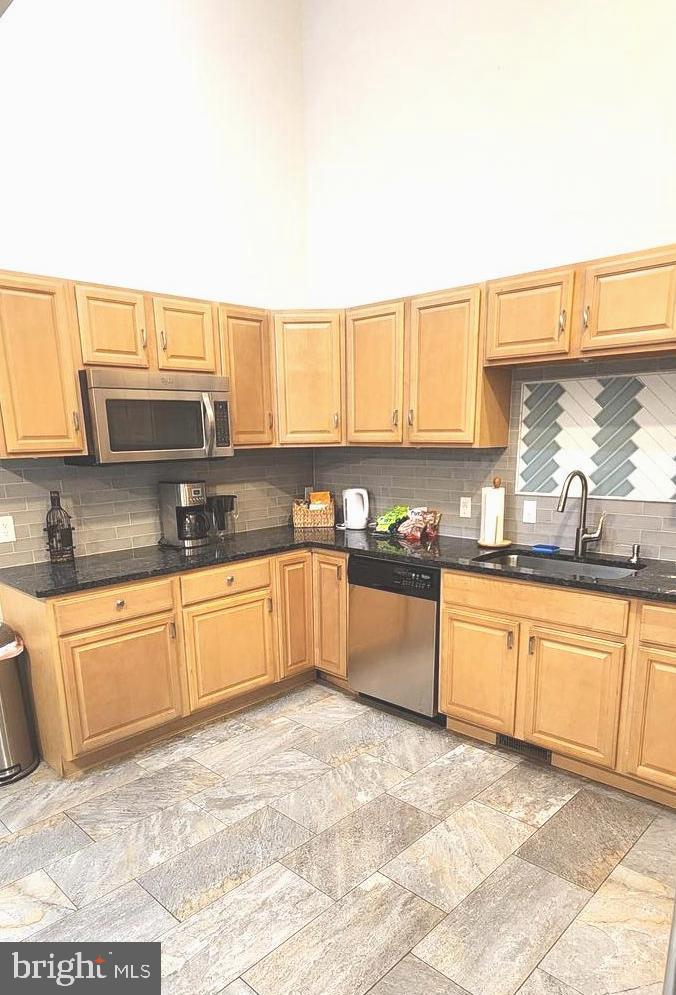 1112 Lee Road Basye, VA 22810 - Photo 23 of 102 a kitchen with granite countertop a stove a sink and a granite counter tops