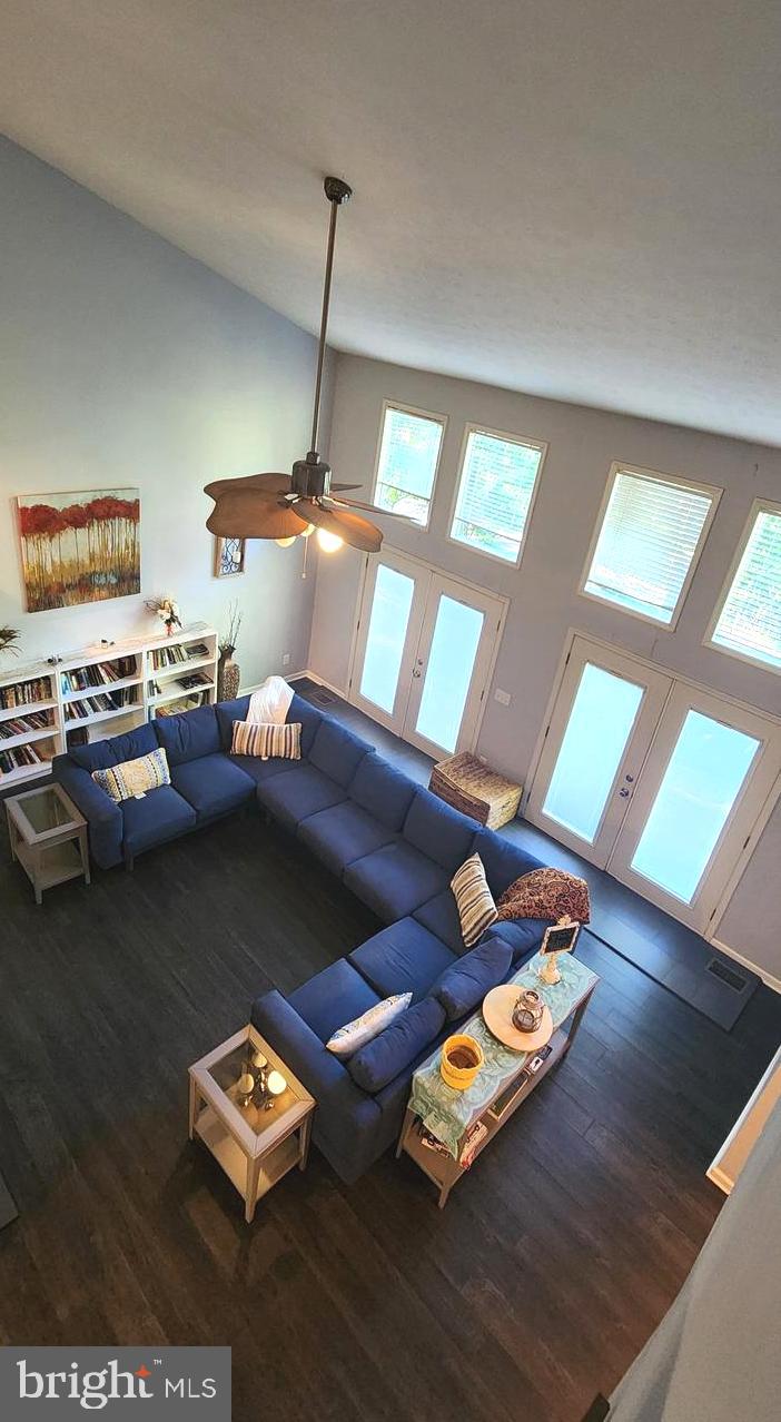 1112 Lee Road Basye, VA 22810 - Photo 52 of 102 a living room with furniture and a wooden floor