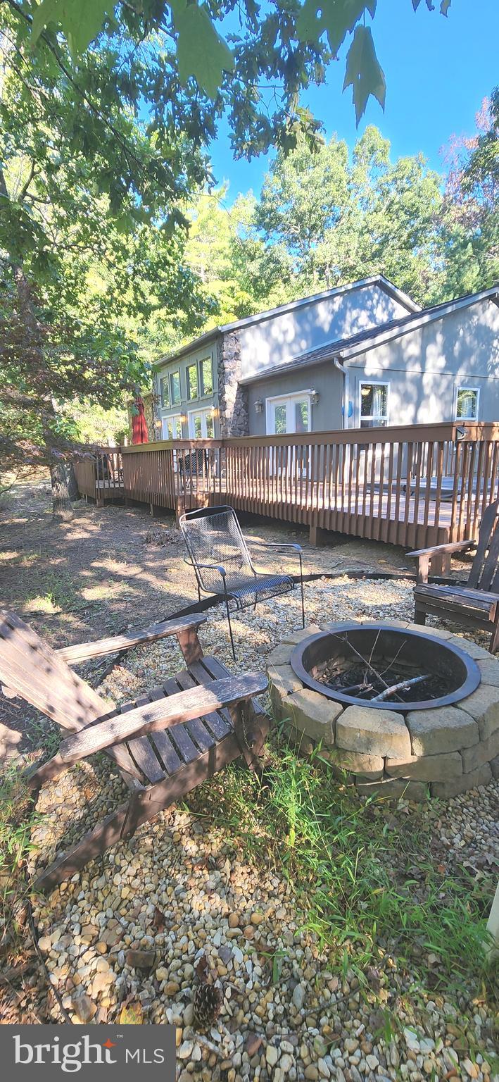 1112 Lee Road Basye, VA 22810 - Photo 57 of 102 a backyard of a house with lots of green space