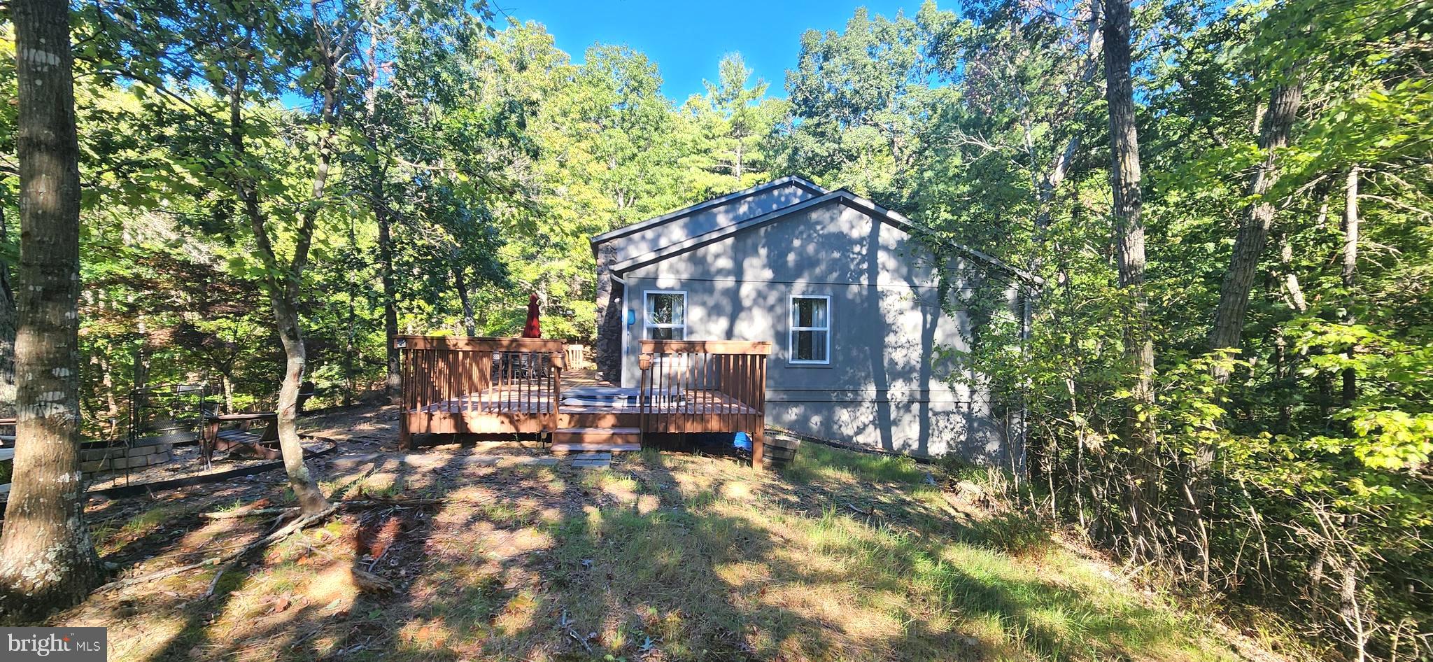 1112 Lee Road Basye, VA 22810 - Photo 58 of 102 a view of a house with backyard porch and sitting area