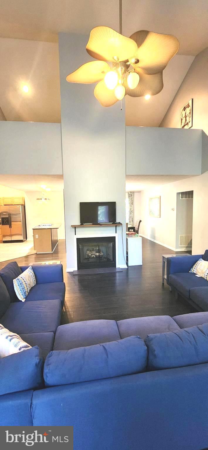 1112 Lee Road Basye, VA 22810 - Photo 6 of 102 a living room with furniture and a flat screen tv