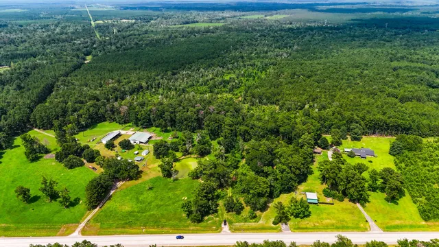 a backyard of a house with lots of green space