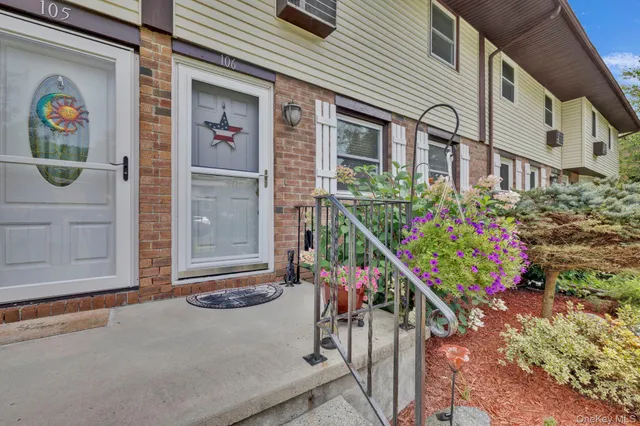 a front view of building with an outdoor space