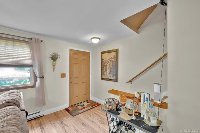 a view of livingroom with furniture and windows