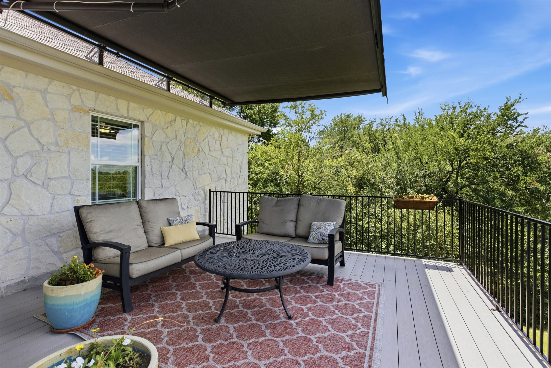 1804 Tanner Loop Taylor, TX 76574 - Photo 36 of 40 The patio is equipped with a roll-down sunshade that doesn't obstruct the view.