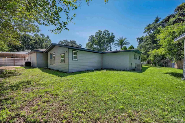 a view of a backyard with a garden