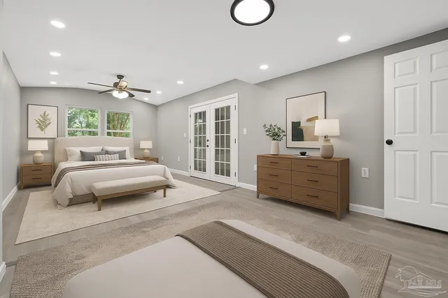 a bedroom with a bed and a dresser