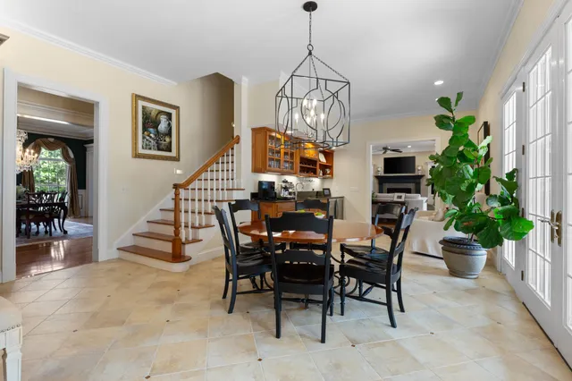 a living room with furniture fireplace and a flat screen tv