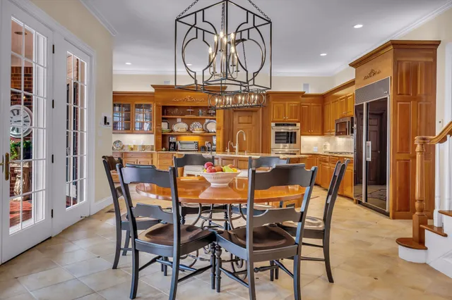 a living room with furniture ceiling fan and a rug