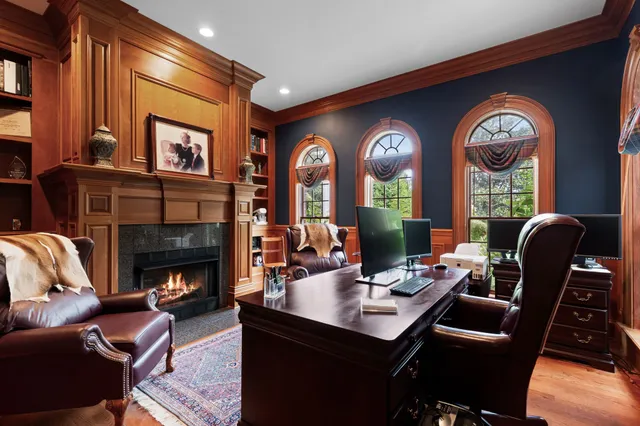 a view of a livingroom with furniture and a flat screen tv