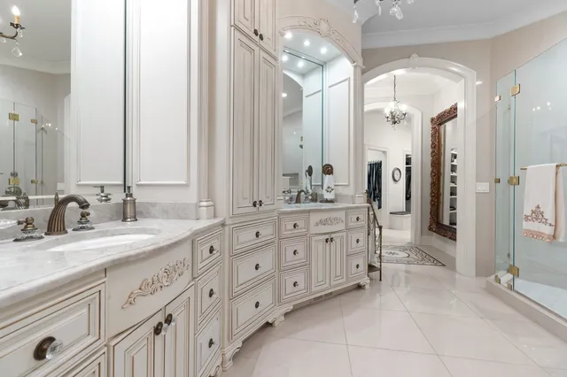 a bathroom with a sink a vanity and a mirror