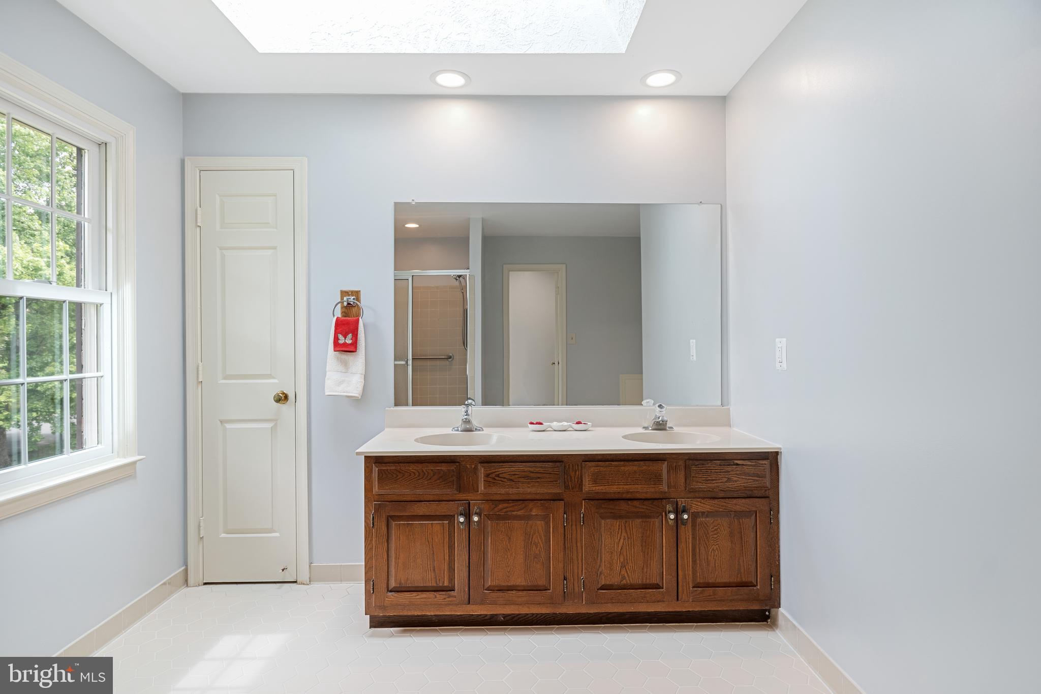 11609 Le Havre Drive Potomac, MD 20854 - Photo 54 of 90 Double Vanity and Skylight