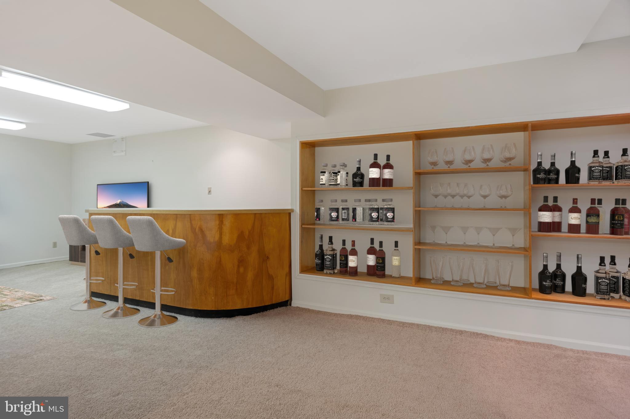 11609 Le Havre Drive Potomac, MD 20854 - Photo 71 of 90 Virtually Staged - Lower Lvl Wet Bar & Built-Ins