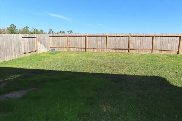 a view of outdoor space with a garden and stairs