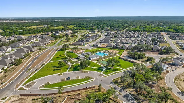 a view of a swimming pool and lake view