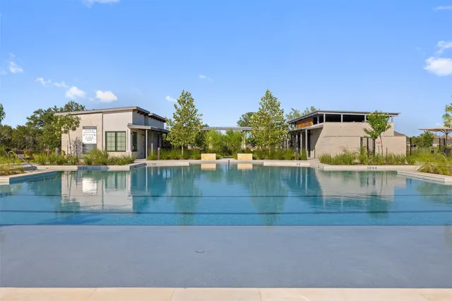 an aerial view of a house with a garden