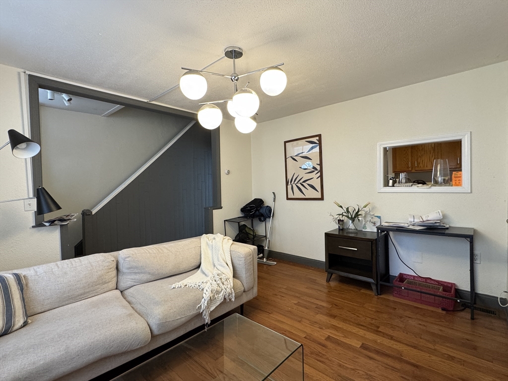 286 Bowen Street Boston, MA 02127 - Photo 1 of 12 a living room with furniture