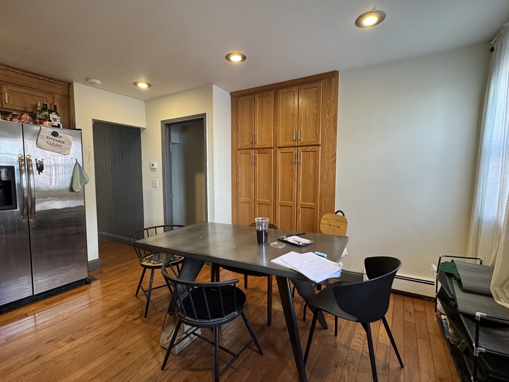 286 Bowen Street Boston, MA 02127 - Photo 3 of 12 a view of a dining room with furniture and a window