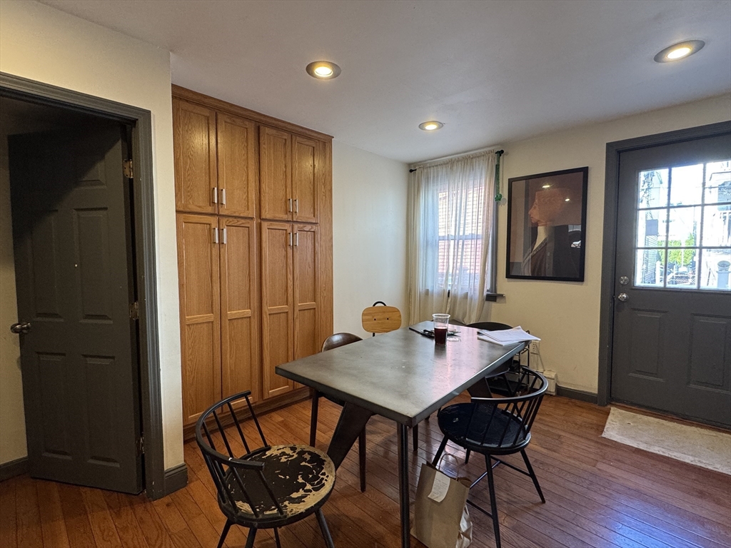 286 Bowen Street Boston, MA 02127 - Photo 4 of 12 a view of a dining room with furniture window and wooden floor