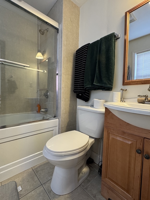 286 Bowen Street Boston, MA 02127 - Photo 10 of 12 a bathroom with a sink toilet and shower