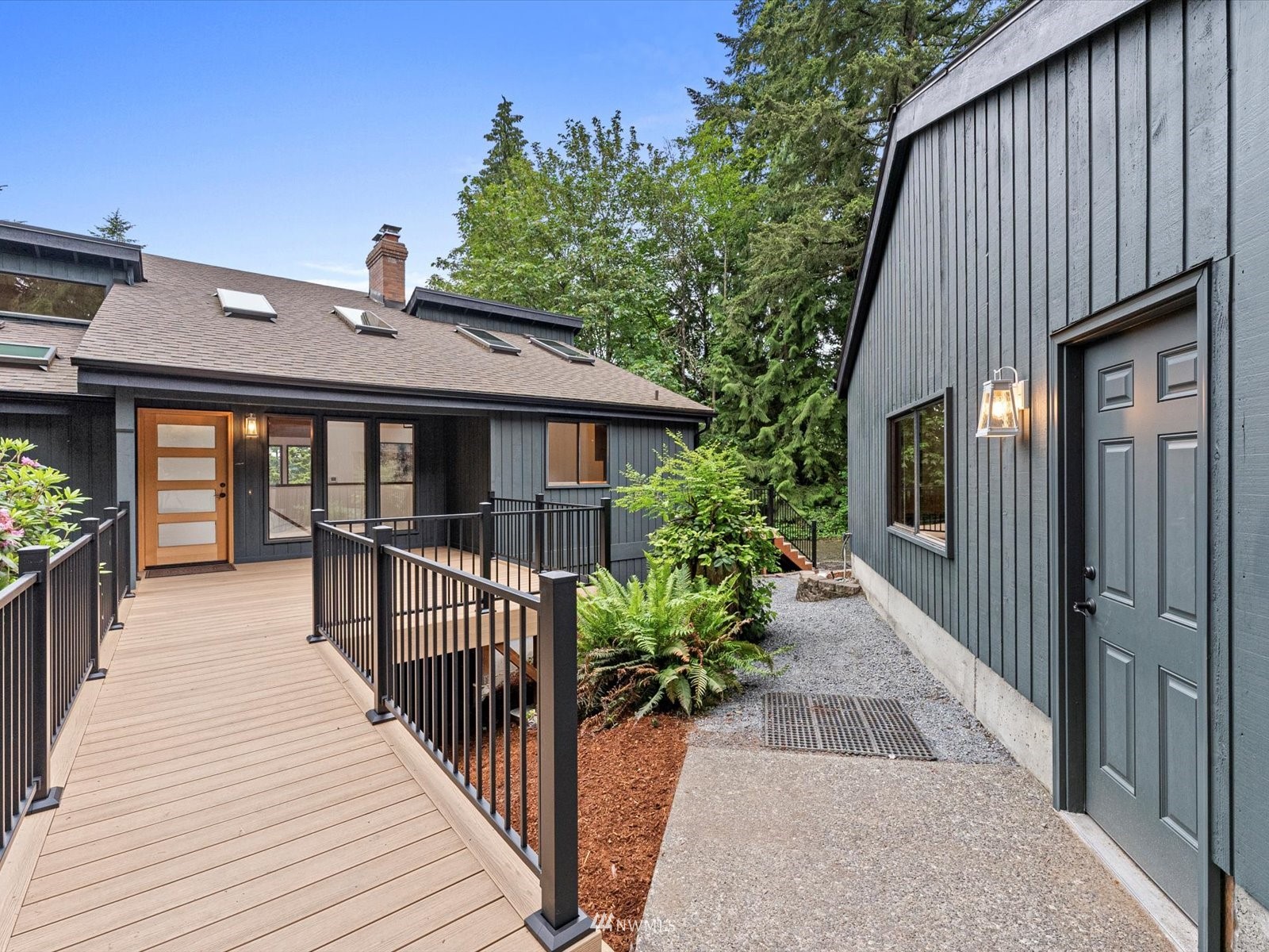 21931 3rd Avenue Southeast Bothell, WA 98021 - Photo 2 of 39 a front view of a house with yard and balcony