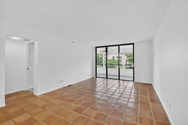 a view of a room with a large window