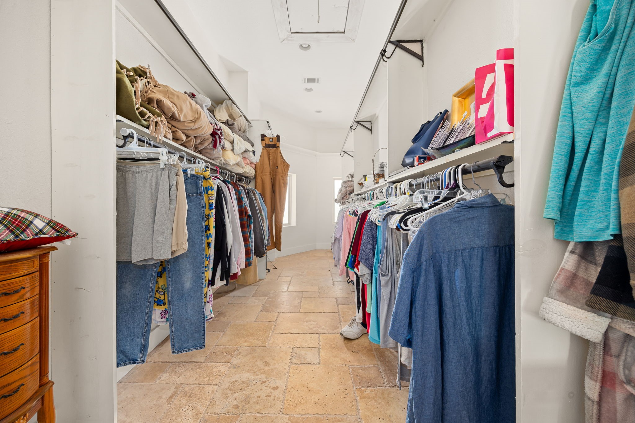 7336 Highland Ranch Road Caldwell, TX 77836 - Photo 13 of 25 a view of walk in closet with clothes and shoes