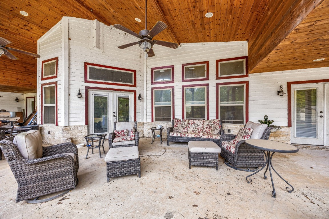 7336 Highland Ranch Road Caldwell, TX 77836 - Photo 17 of 25 a building outdoor space with couches and potted plant