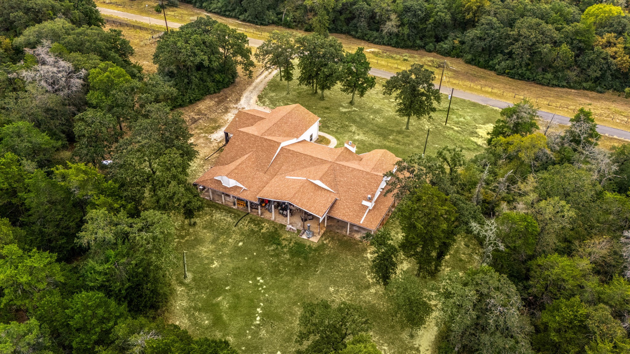 7336 Highland Ranch Road Caldwell, TX 77836 - Photo 22 of 25 an aerial view of houses with yard