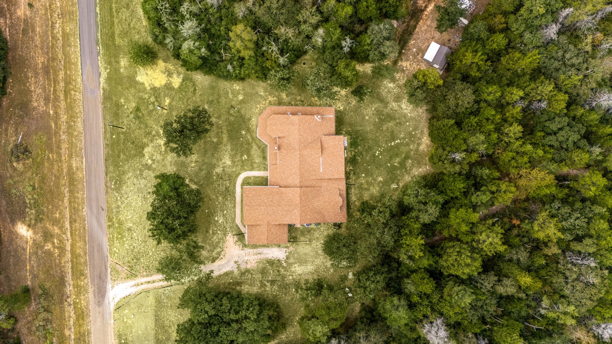7336 Highland Ranch Road Caldwell, TX 77836 - Photo 23 of 25 a building view with a outdoor space