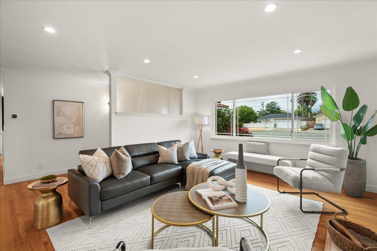 7669 Rainbow Drive Cupertino, CA 95014 - Photo 12 of 37 a living room with furniture and a large window