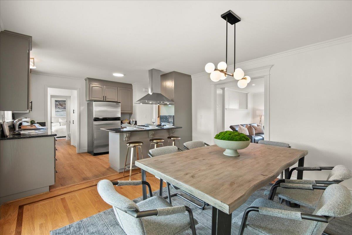 7669 Rainbow Drive Cupertino, CA 95014 - Photo 16 of 37 a kitchen with a table and chairs in it
